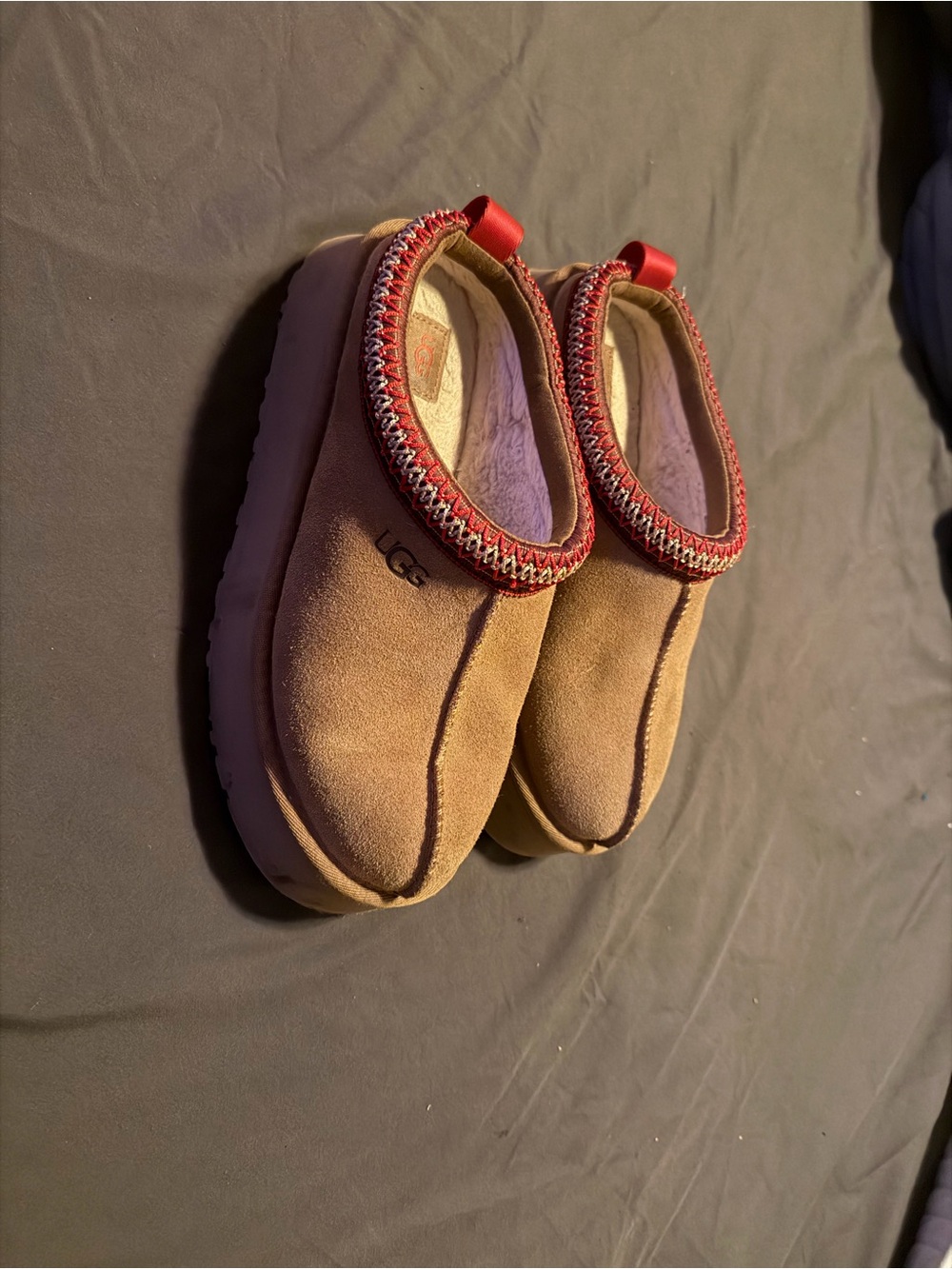 UGG Kids Chestnut Suede Slip-Ons with Red Trim platform